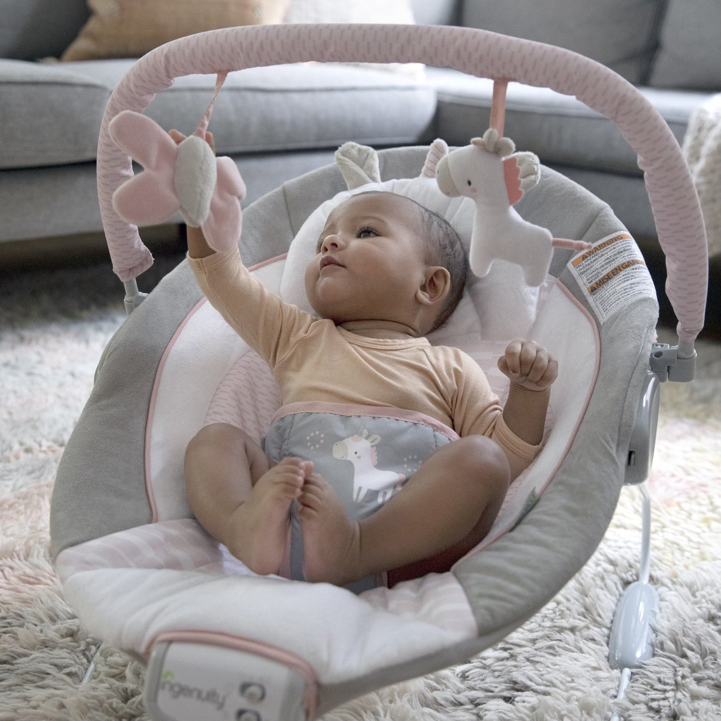 Flora the Unicorn Vibrating Infant Baby Bouncer, Pink